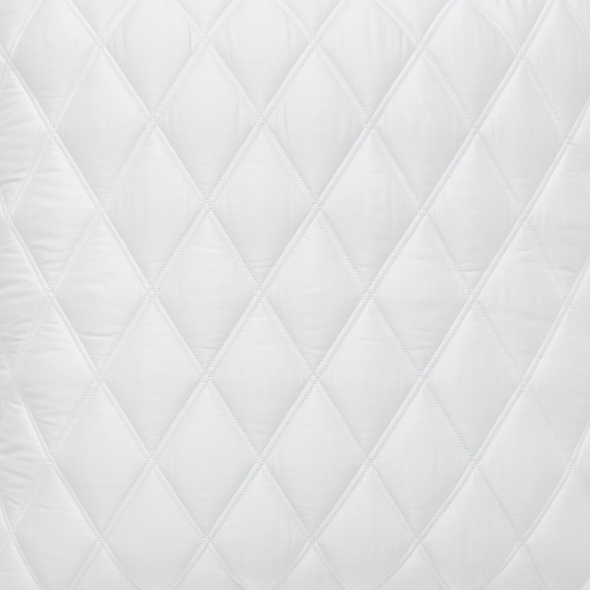 CL-179-11096_7|Close-up of a crisp white diamond quilted coverlet texture, emphasizing its elegant pattern and soft, comforting feel.