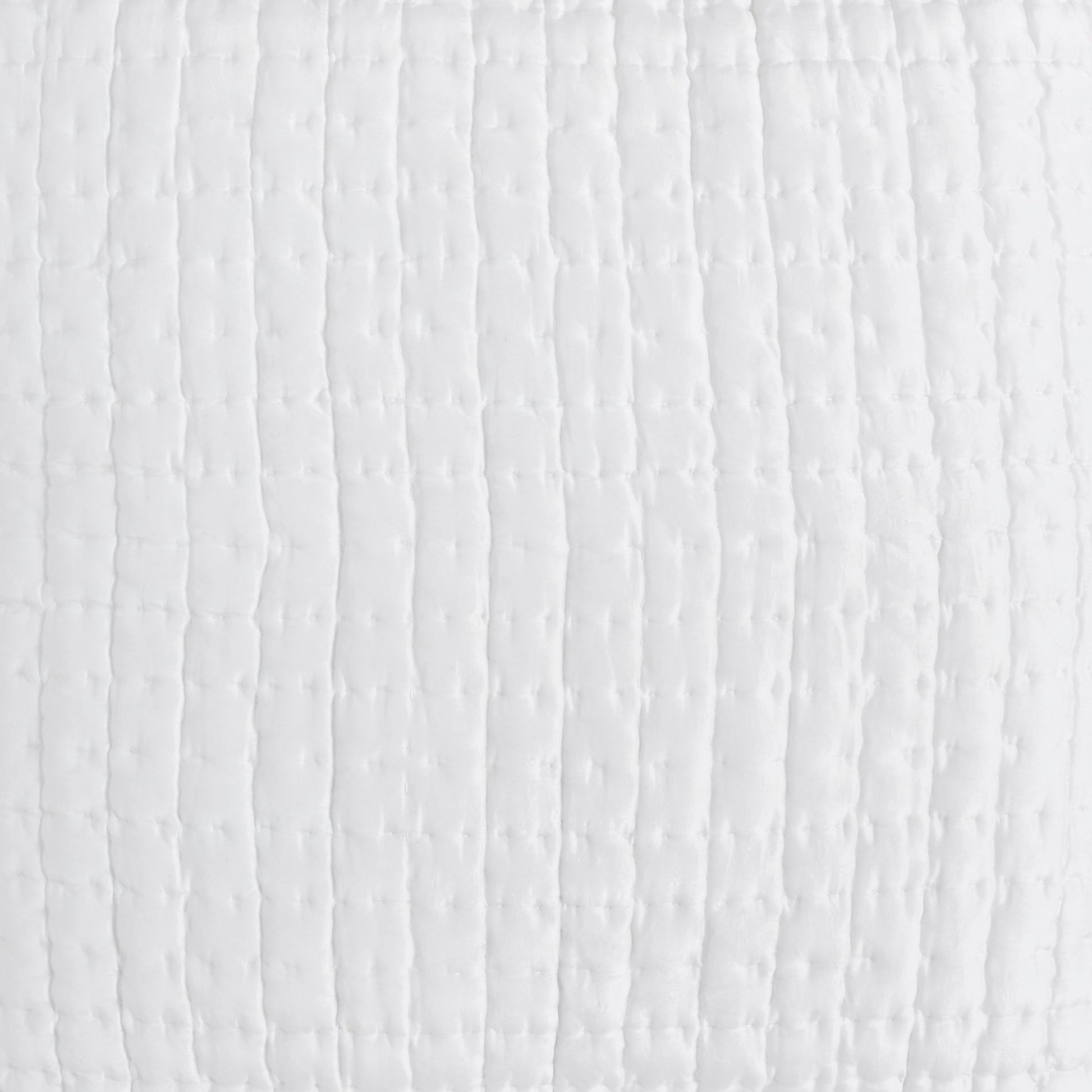 CL-176-9496_2|Close-up of a plush white channel quilted coverlet texture, highlighting its soft, inviting, and detailed design.