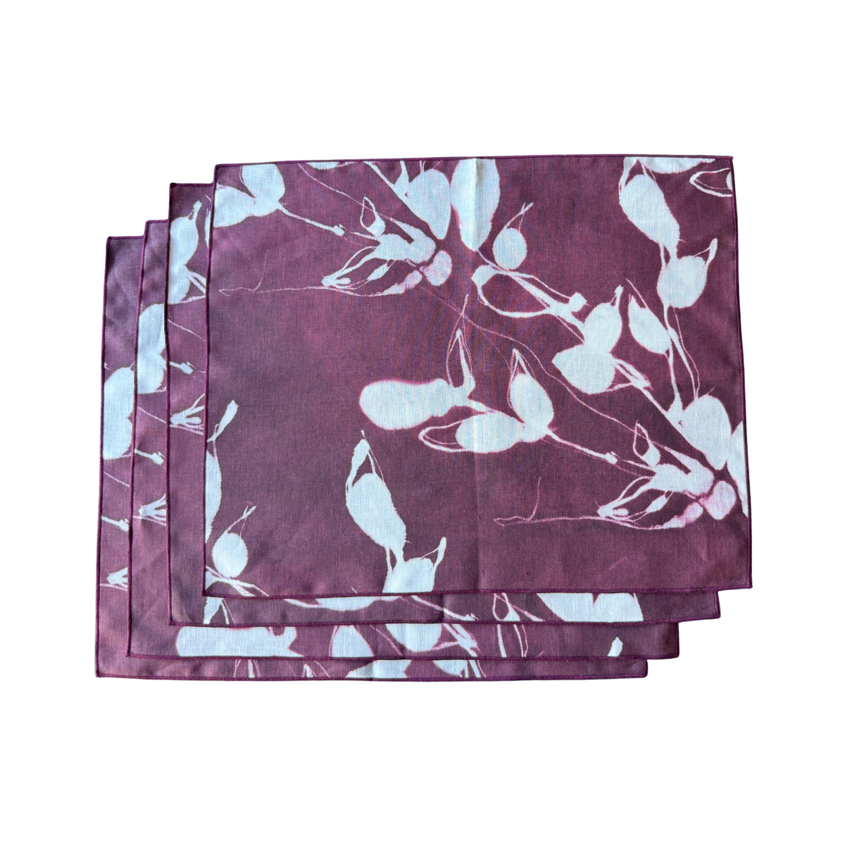 Porto Print Aubergine linen placemat flat lay close up of hand-painted floral detail - Goldie Home