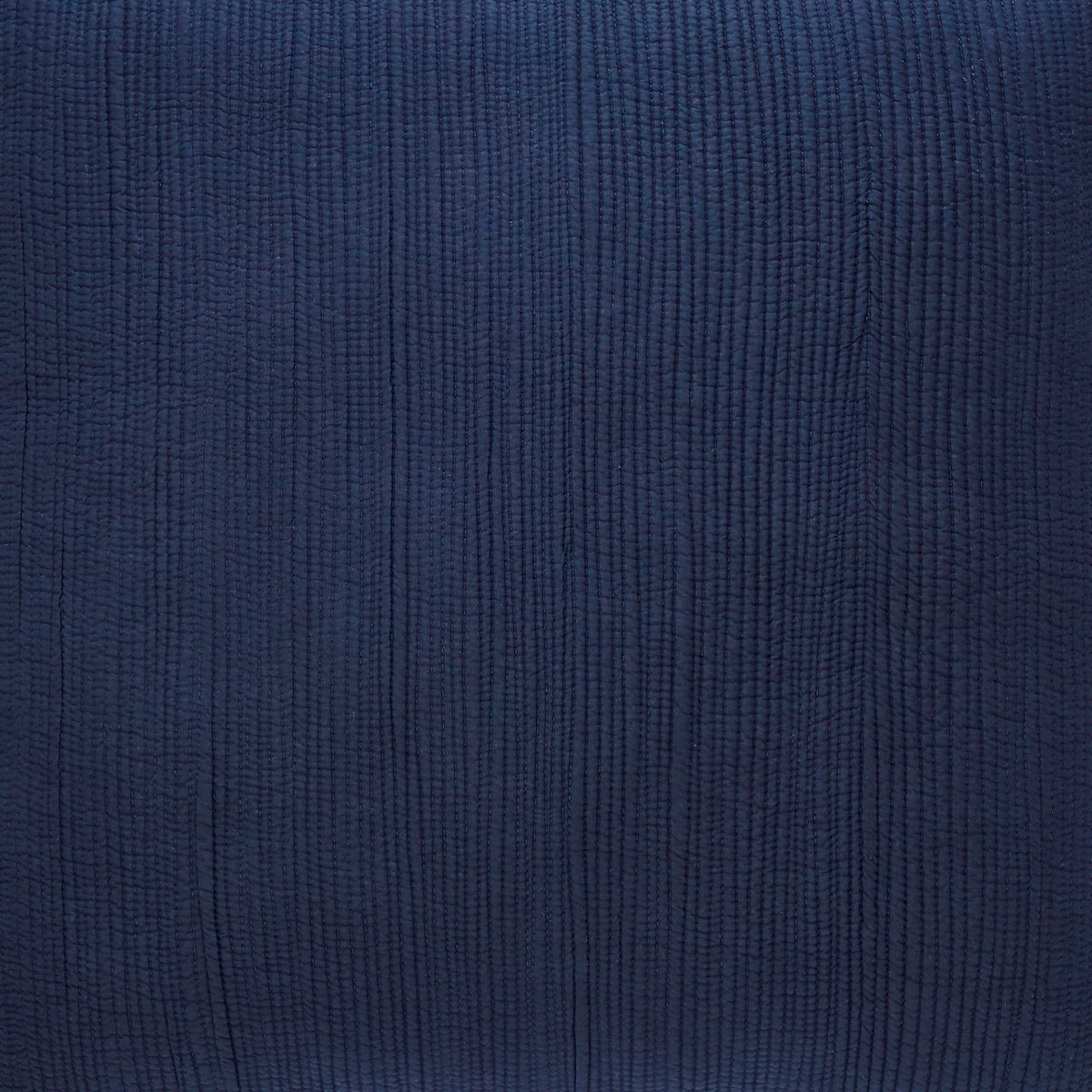 ES-167-2626_2|Close-up of a deep navy blue coverlet showcasing a subtle vertical ribbed and quilted texture, perfect for sophisticated bedding.