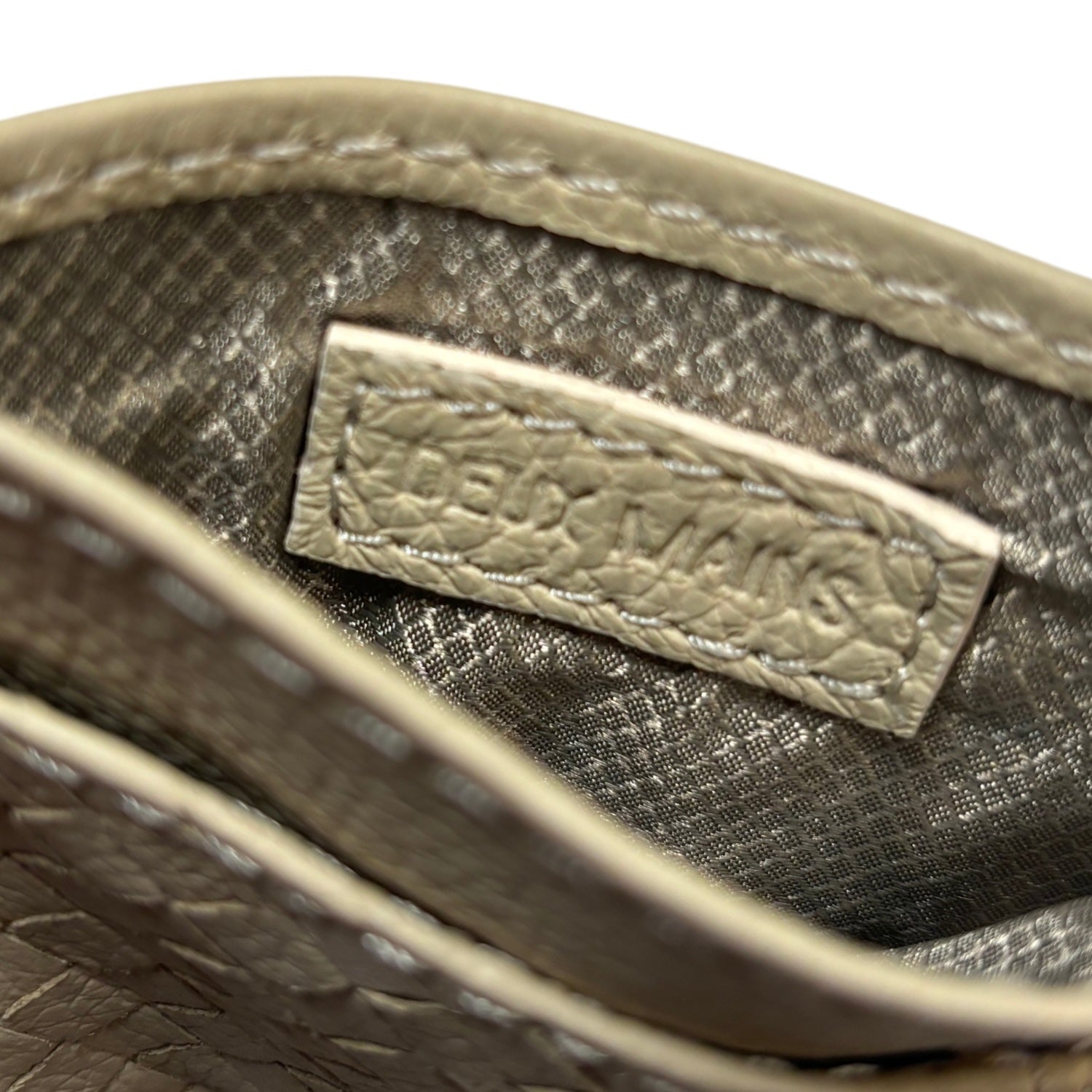 Interior view of bone-colored ID holder from Spring/Summer collection.