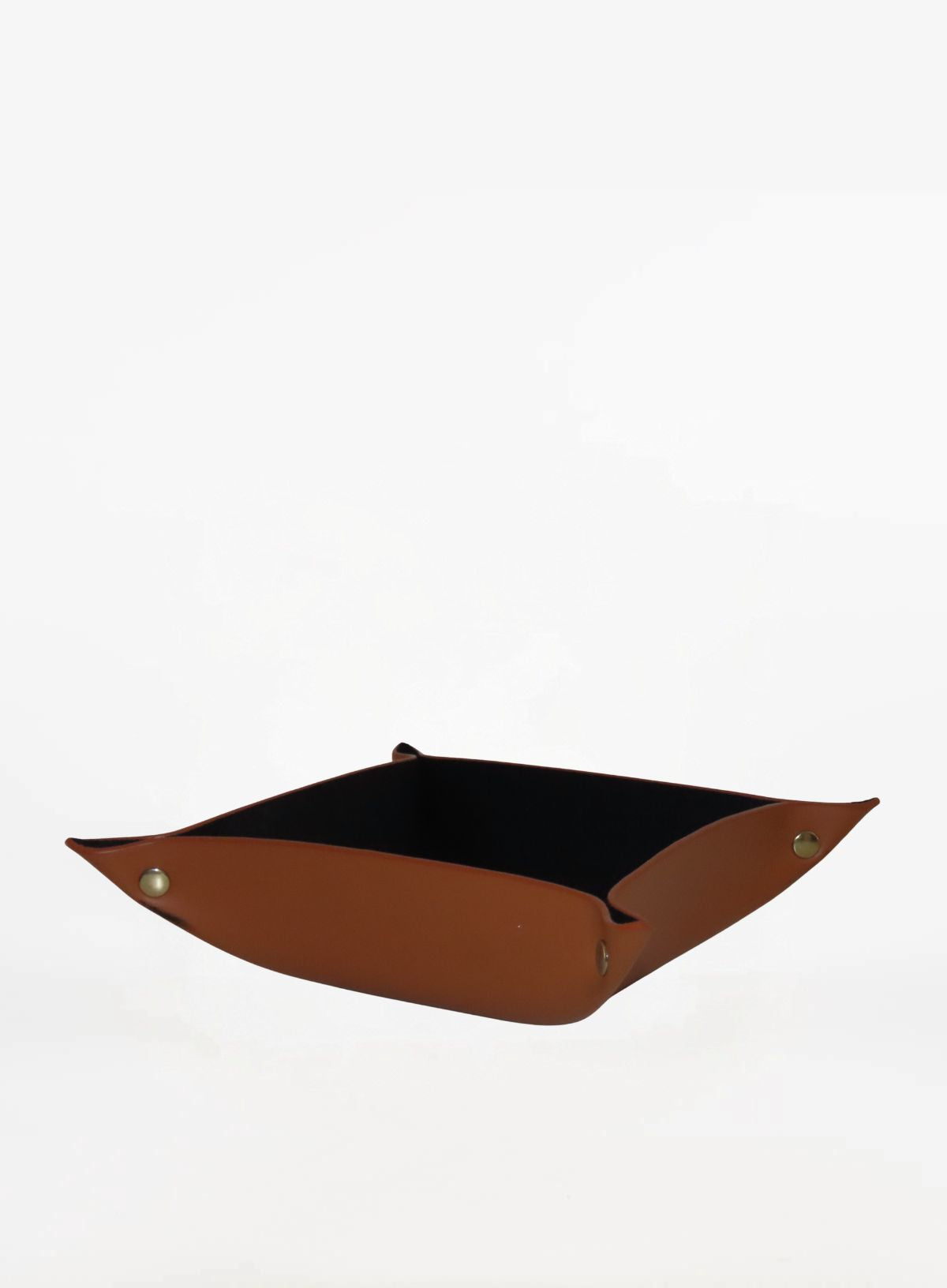 the black valet tray in cognac from corporate goods collection.