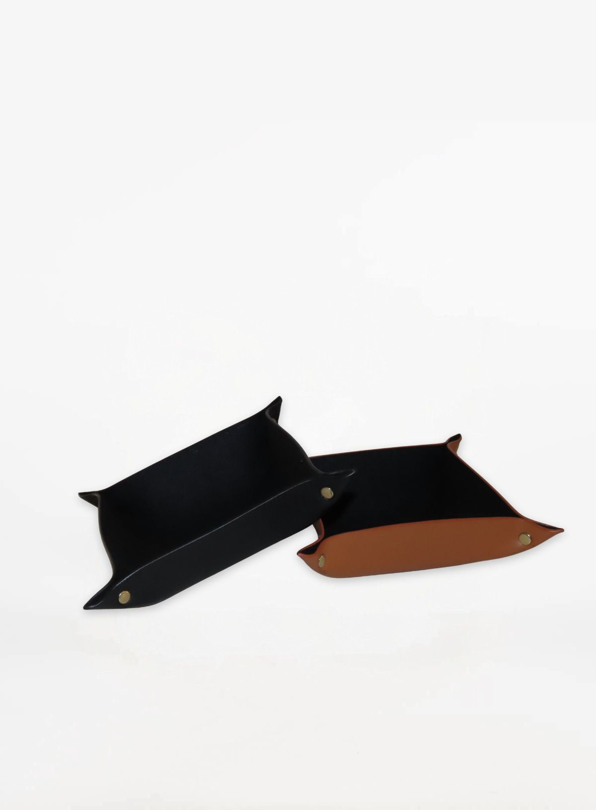 the black valet tray in cognac and black from corporate goods collection.